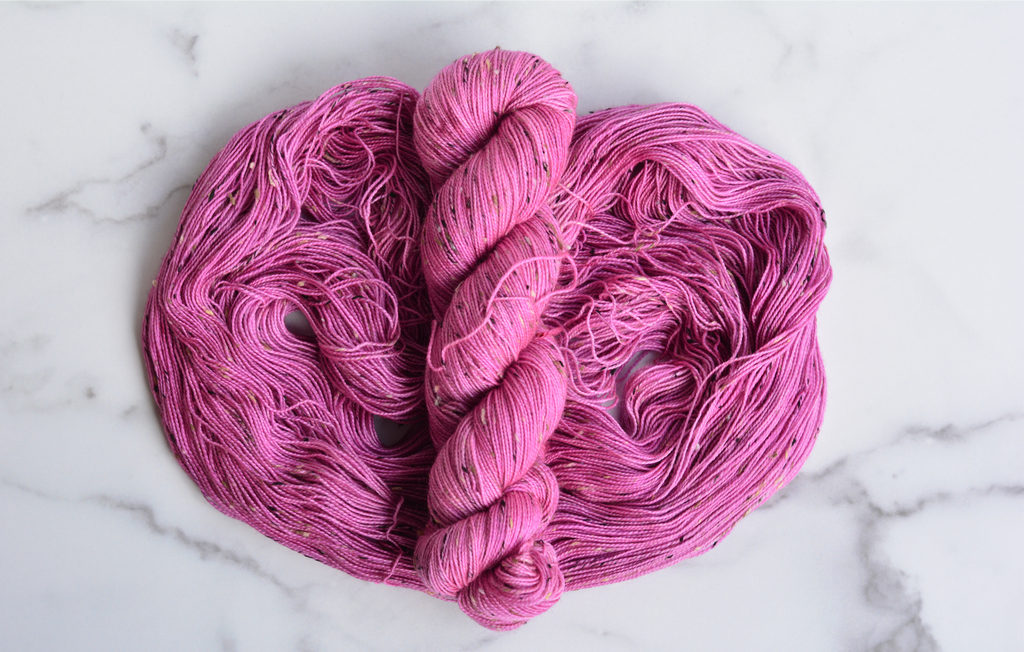 'Plum Cake'- 85% Superwash Bluefaced Leicester Wool, 15% Donegal Nep, 438 Yards, 100 Grams