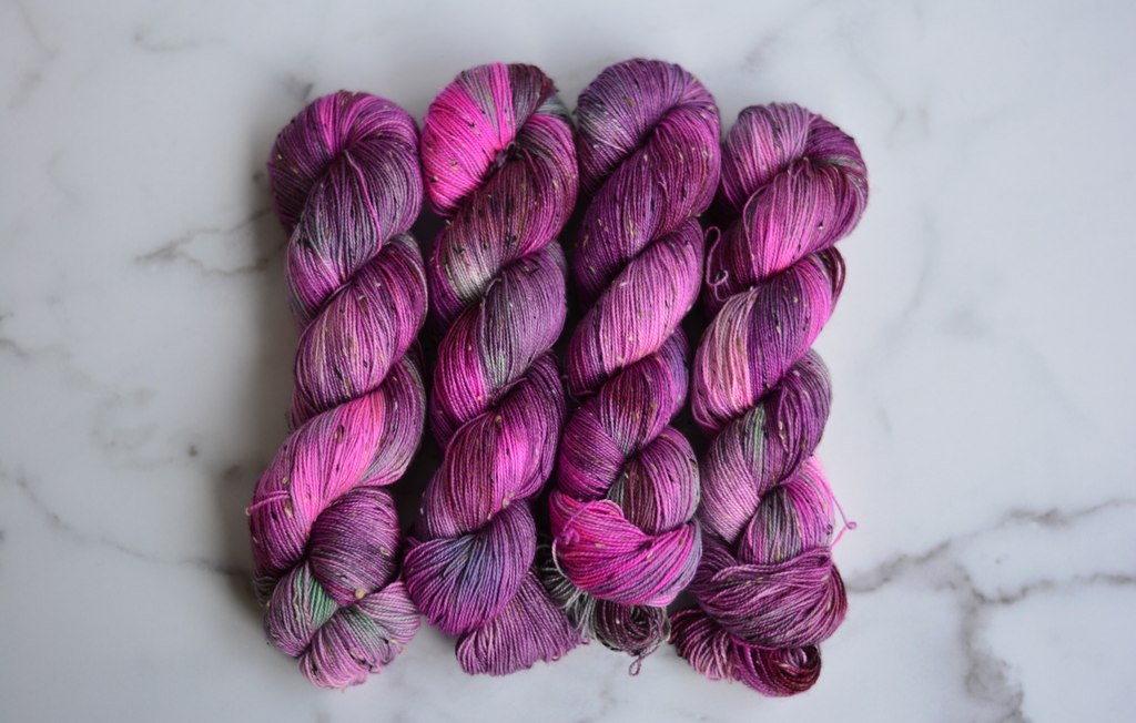 'Dragonfruit'- 85% Superwash Bluefaced Leicester Wool, 15% Donegal Nep, 438 Yards, 100 Grams