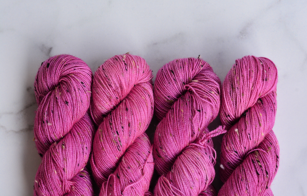 'Plum Cake'- 85% Superwash Bluefaced Leicester Wool, 15% Donegal Nep, 438 Yards, 100 Grams